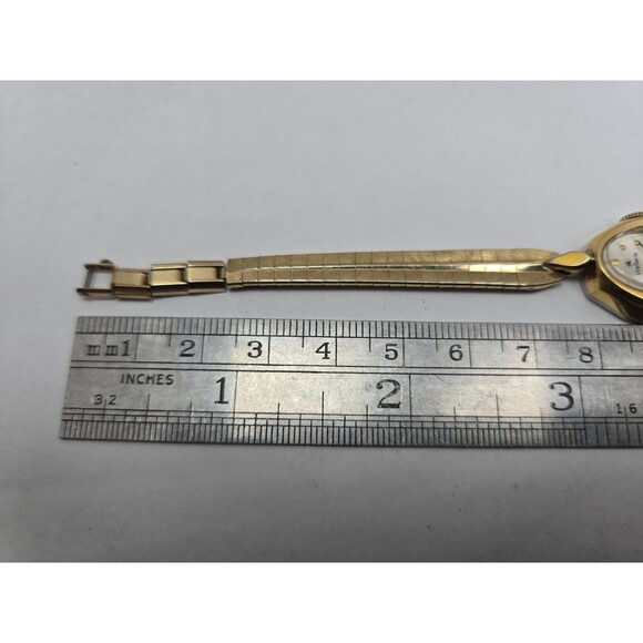 Vintage Stellaris 17 Jewels Swiss Made Womens Gold Tone Oval Wind Up Dress Watch